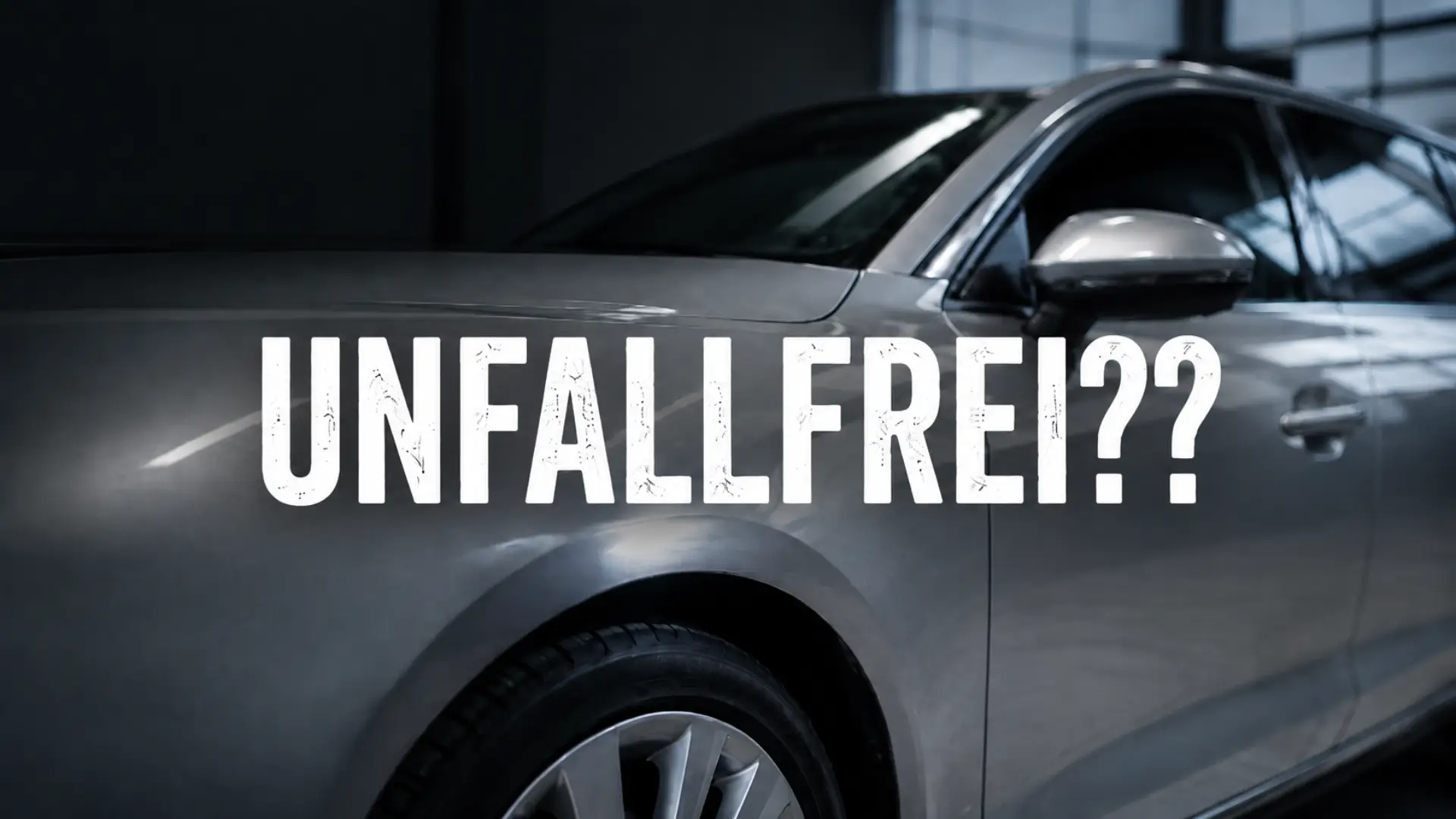Srebrni automobil u radionici s natpisom UNFALLFREI kao simbol provjere da li je vozilo zaista bez udesa.